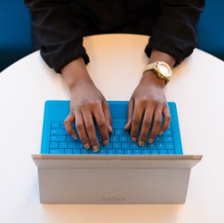 person-typing-on-a-laptop-1181208